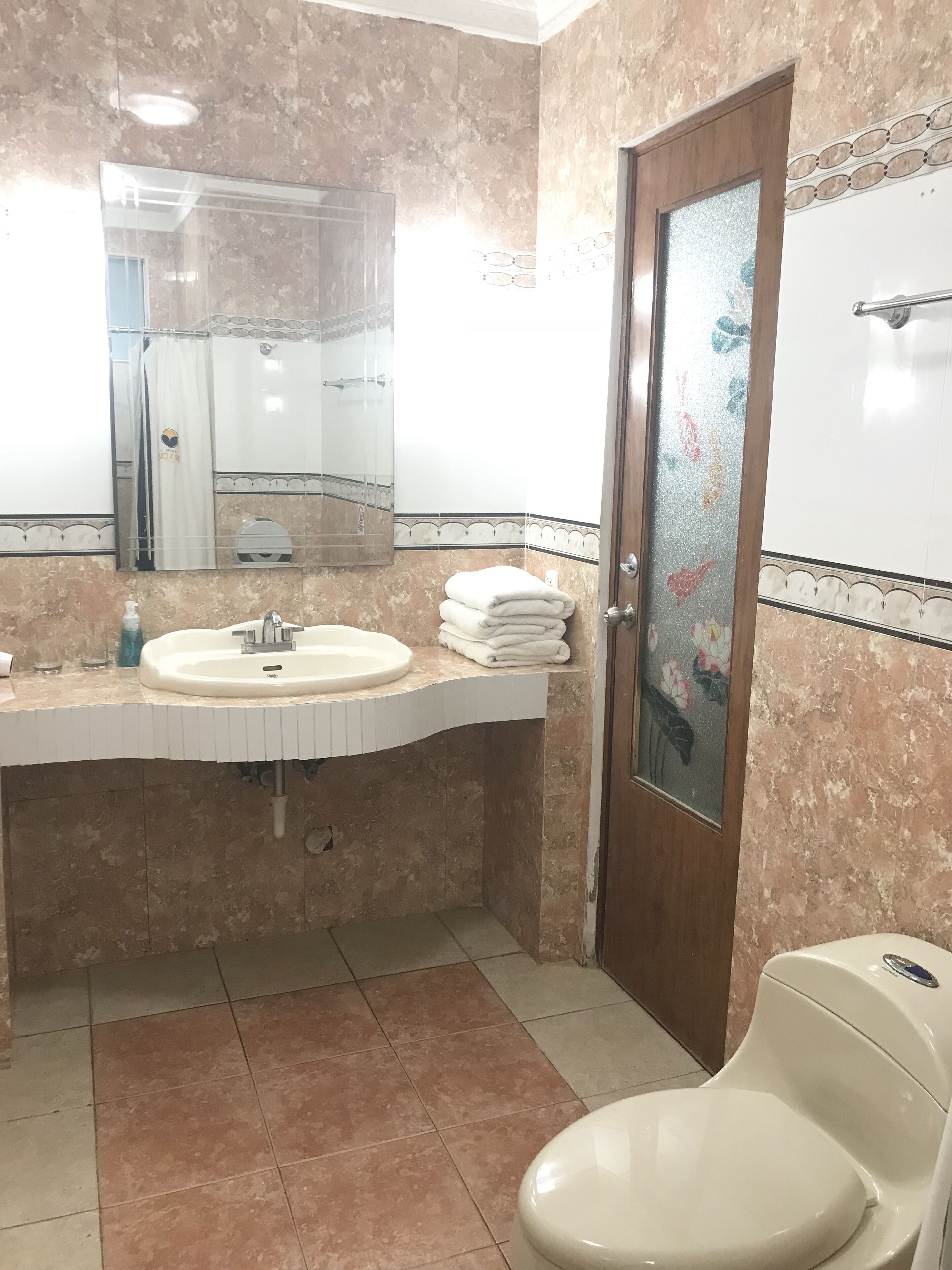 familyroom1king and1queenpatioview | in-room safe, iron/ironing board, free wifi, bed sheets