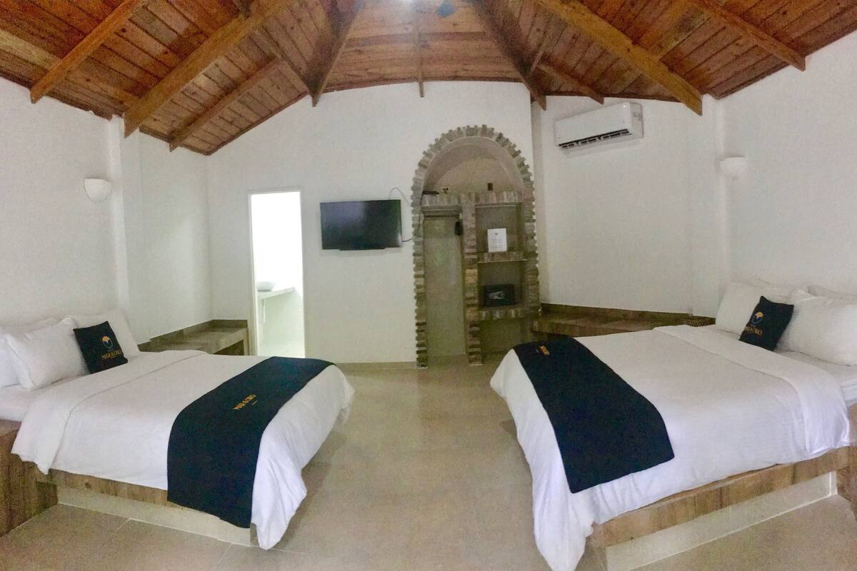 FamilyRoom1King and1QueenPatioView | In-room safe, iron/ironing board (on request), WiFi (free), bed sheets