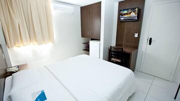Frigobar, cortinas blackout, Wi-Fi de cortesia, roupa de cama