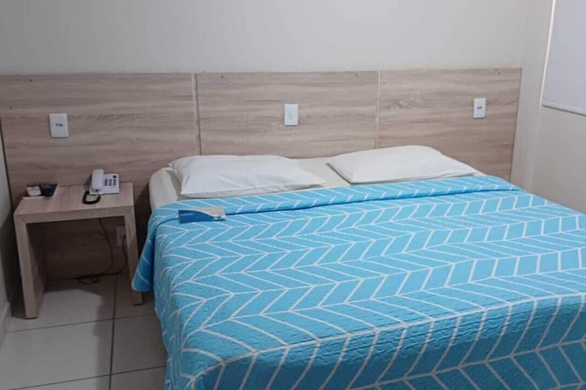 Standard Double Room Single Use | Minibar, blackout curtains, free WiFi, bed sheets