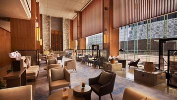 Premium bedding, down comforters, minibar, in-room safe