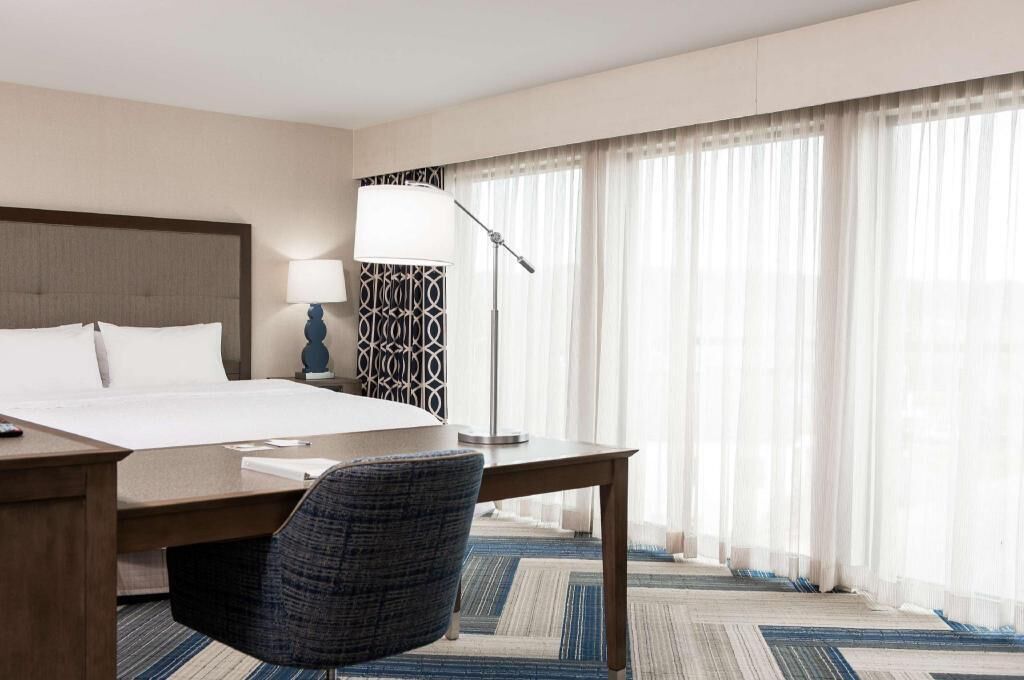 Desk, laptop workspace, blackout curtains, iron/ironing board