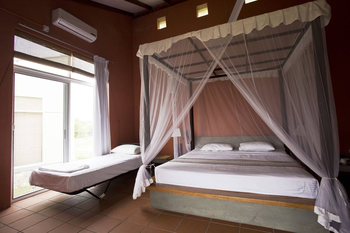 Chalet Confort, 1 très grand lit, vue lagon | Équipements de la chambre
