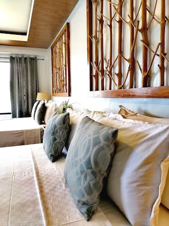 Premium bedding, memory foam beds, minibar, in-room safe