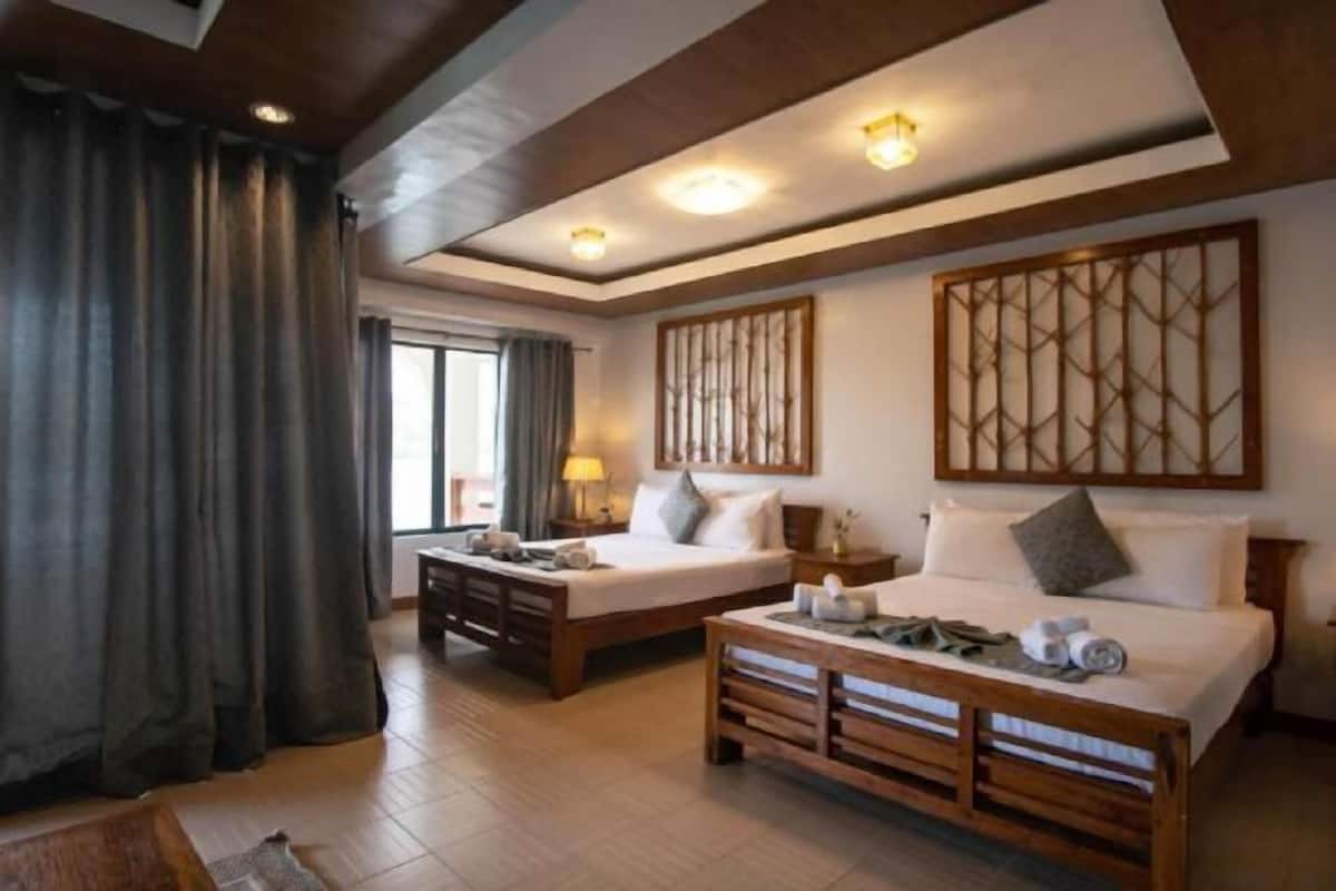 Luxe beddengoed, bedden met traagschuimmatrassen, een minibar