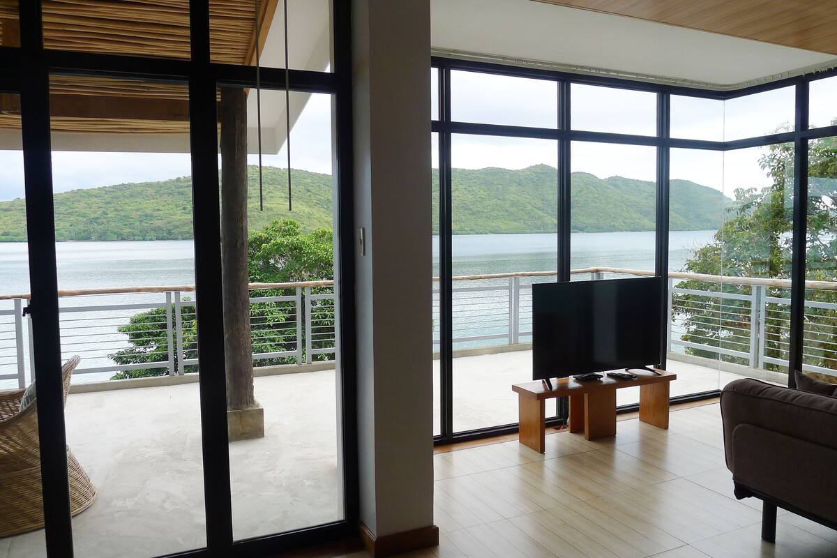 family villa, 1 bedroom, balcony, sea view (hot tub) | living area | 36-inch smart tv with cable channels