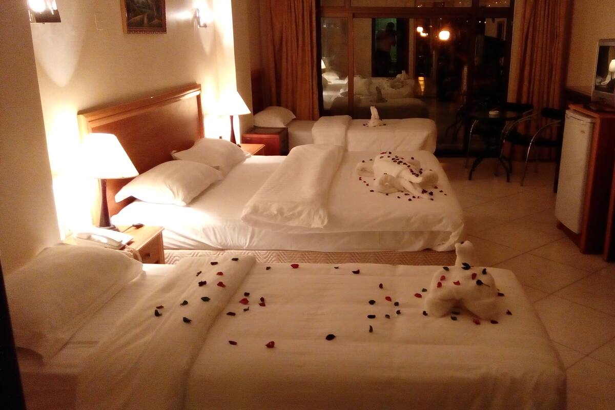 Standard Quadruple Room, 1 Bedroom | Cribs (free), rollaway beds (surcharge), WiFi (free)