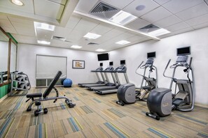 A gym with treadmills, elliptical machines, and free weights. - Holiday Inn Express & Suites Austin - Round Rock Area by IHG (Austin)