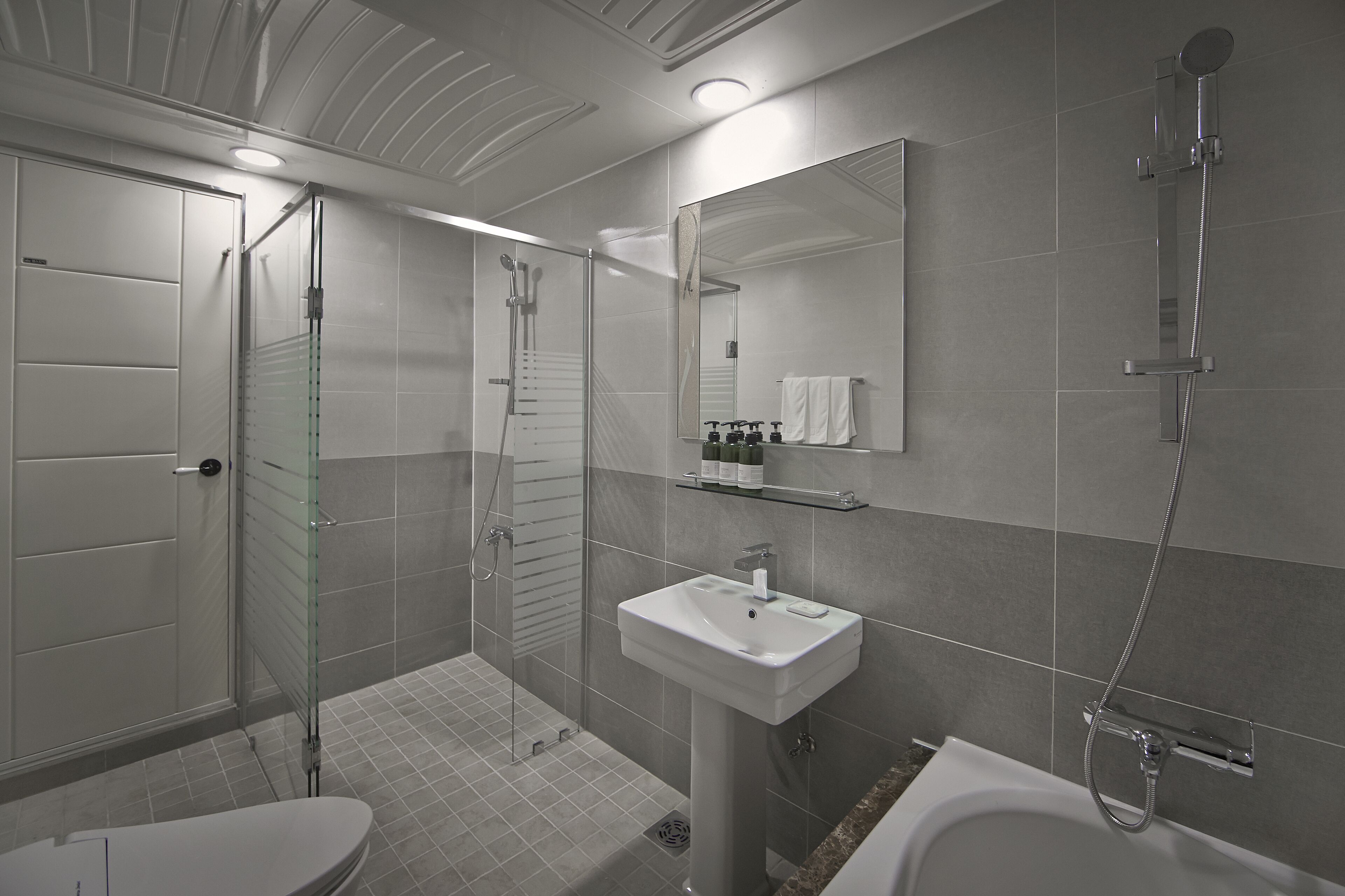 deep-soaking bathtub, free toiletries, hair dryer, bathrobes