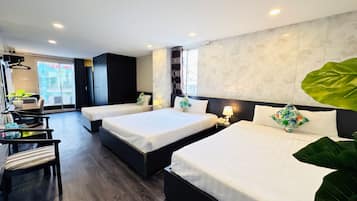 Family Room, Balcony, City View | Desk, soundproofing, free WiFi, bed sheets