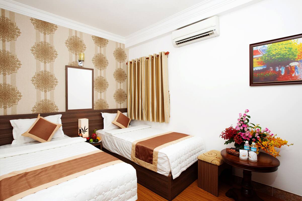 Phòng đôi hoặc 2 giường đơn Deluxe | Minibar, két bảo mật tại phòng, bàn, màn/rèm cản sáng 
