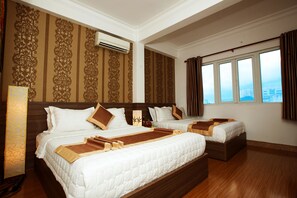 Deluxe Triple Room | Minibar, in-room safe, desk, blackout curtains - Rosa Centre Hotel (Ho Chi Minh City)