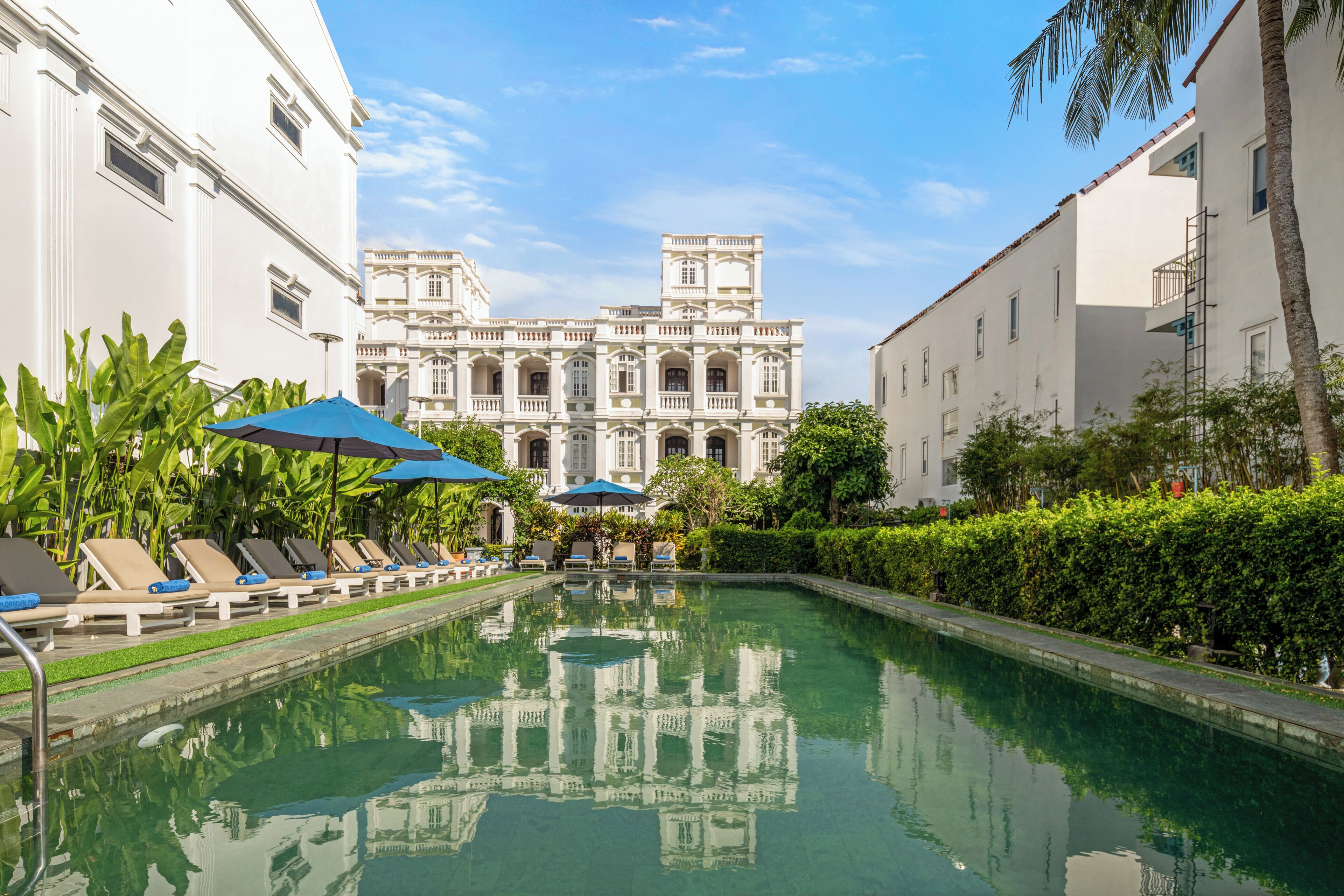 Outdoor pool, pool umbrellas, pool loungers