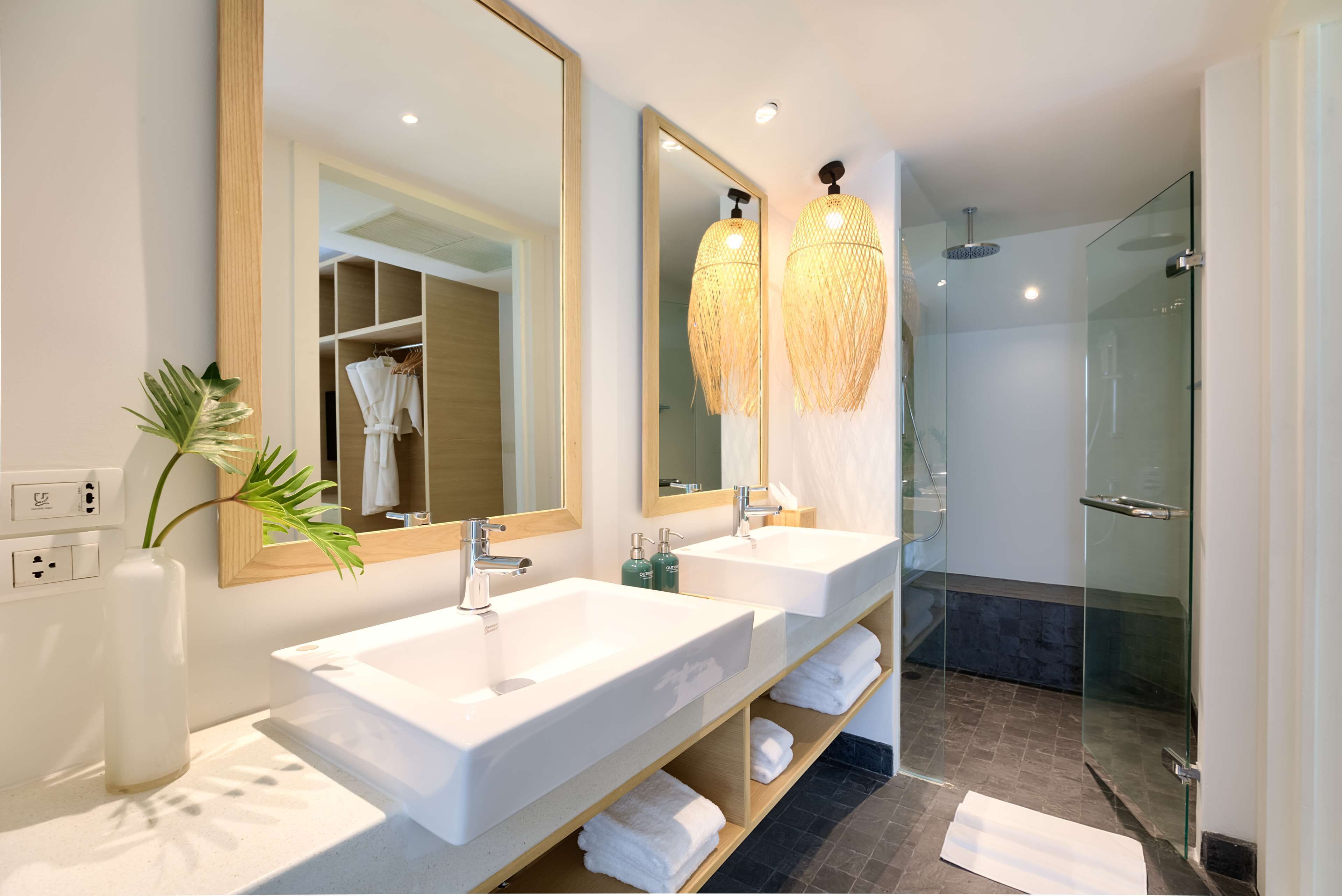 grand suite, 1 king bed with sofa bed (surin) | bathroom | hair dryer, bathrobes, slippers, towels