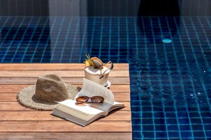 2 outdoor pools, sun loungers