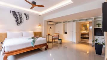 Quarto superior, 1 cama King | Frigobar, cofres nos quartos, cortinas blackout