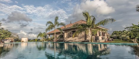 Outdoor pool, pool umbrellas, sun loungers