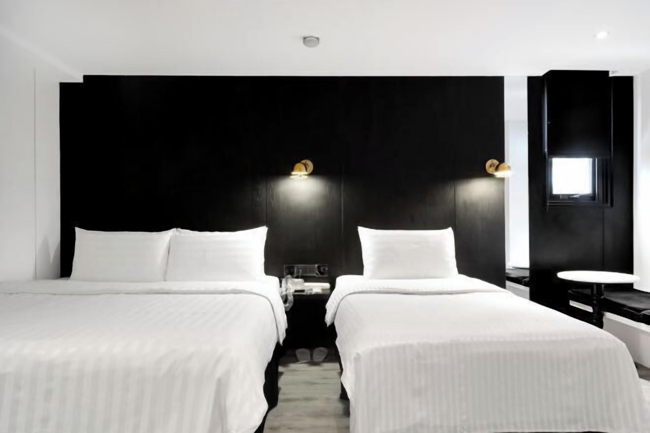 Luxe beddengoed, een minibar, een kluis op de kamer, geluiddichte muren