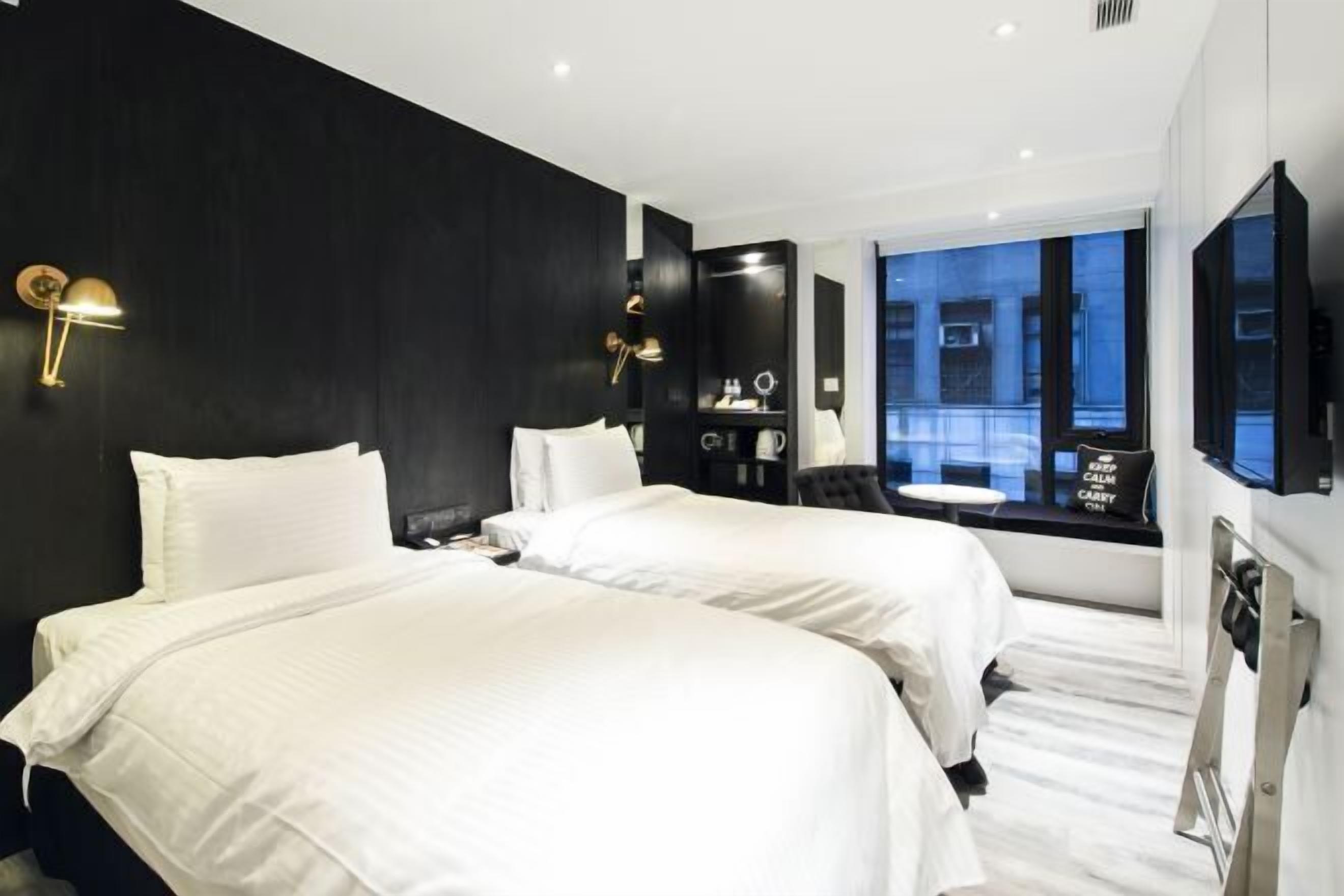 Luxe beddengoed, een minibar, een kluis op de kamer, geluiddichte muren