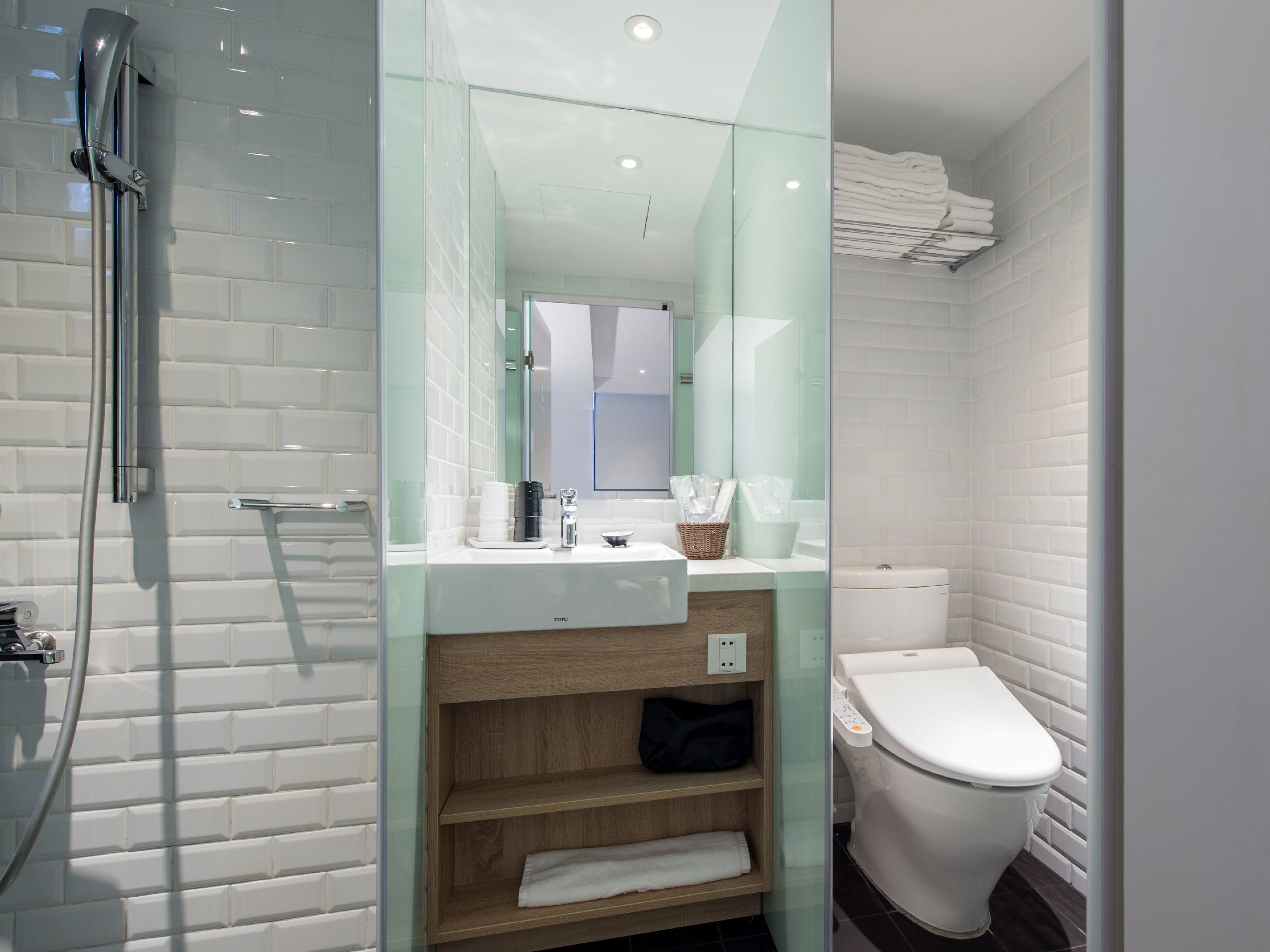 shower, hair dryer, slippers, bidet