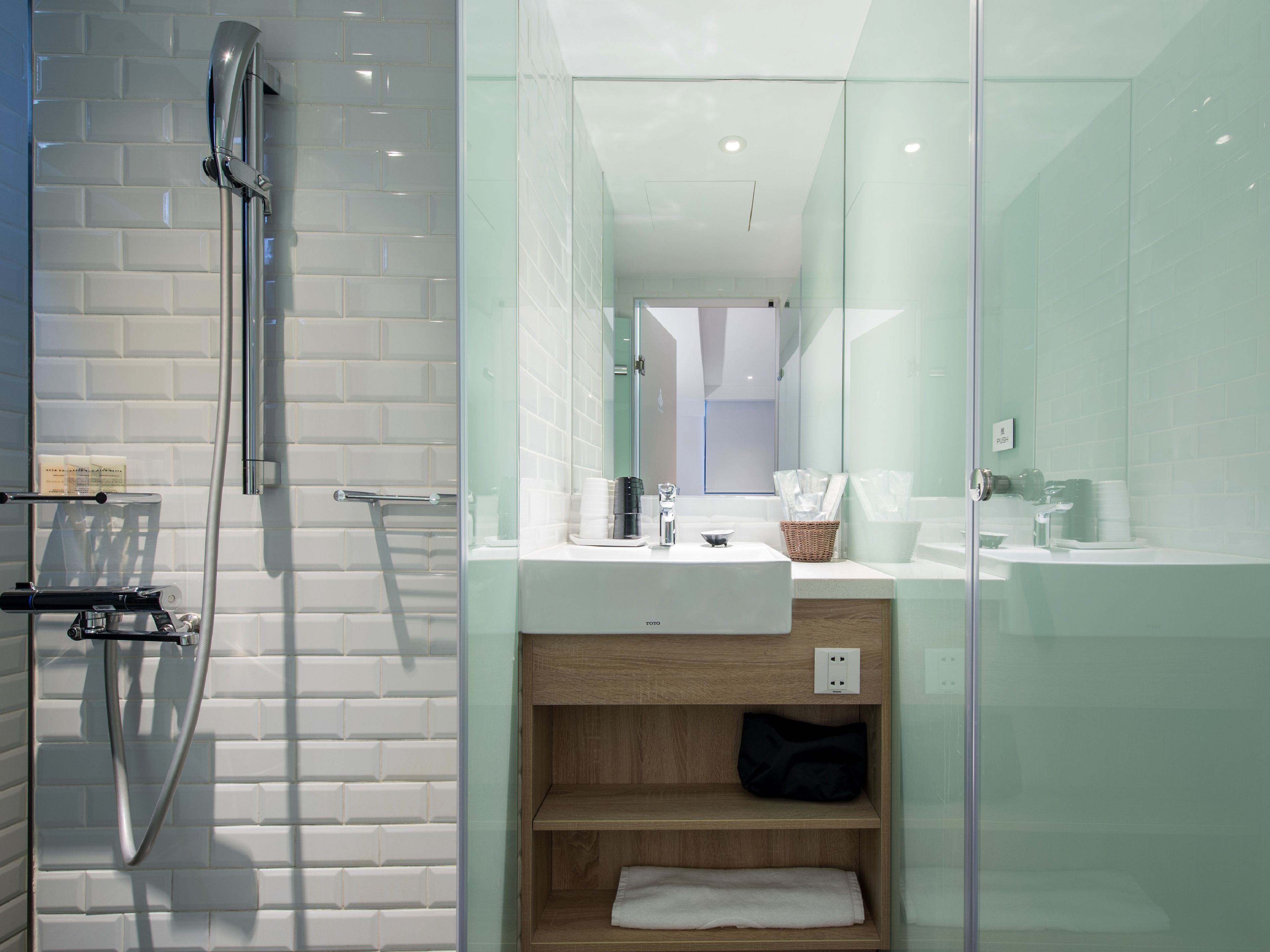 shower, hair dryer, slippers, bidet