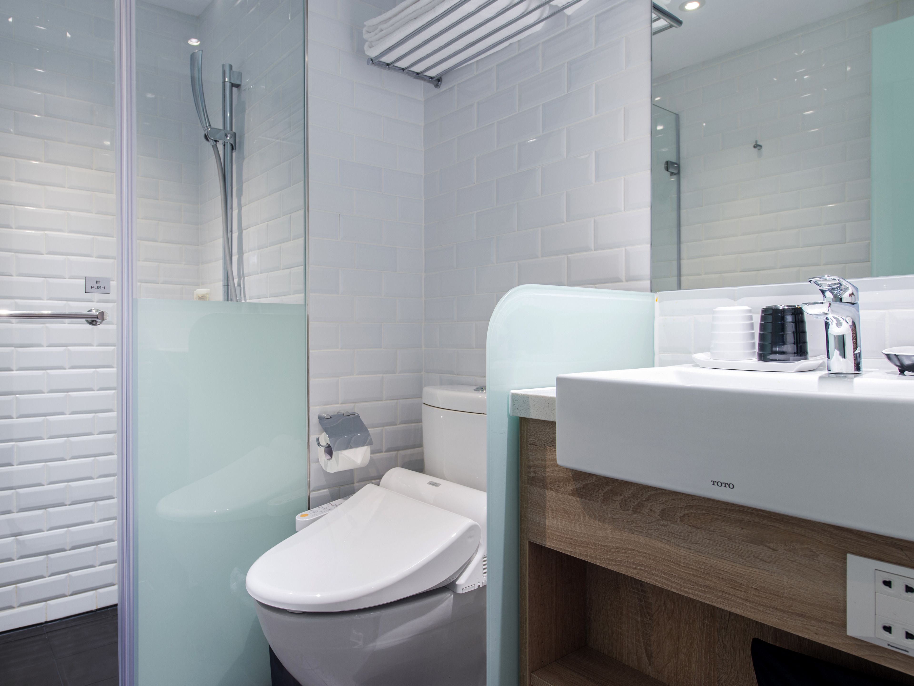 shower, hair dryer, slippers, bidet