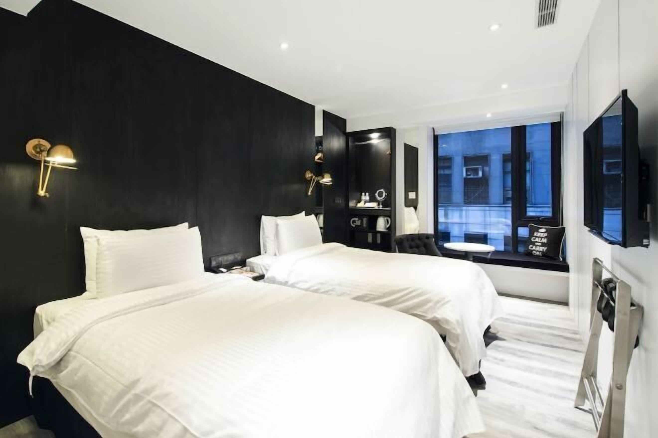 Luxe beddengoed, een minibar, een kluis op de kamer, geluiddichte muren