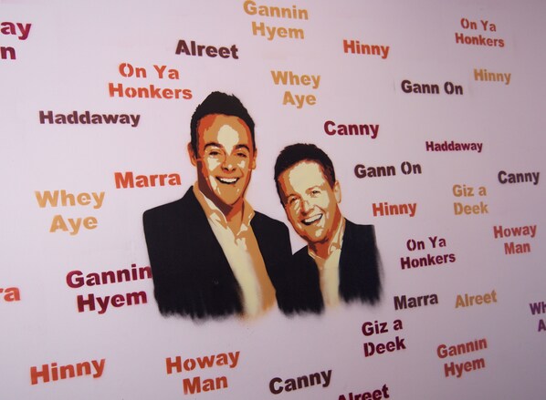 A wall with names in various fonts and colors. - Albatross Hostel (Newcastle-upon-Tyne)
