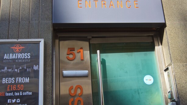 The entrance to Albatross Hostel in Newcastle, with a sign indicating the entrance and a door number 51. - Albatross Hostel (Newcastle-upon-Tyne)
