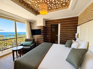 Quarto casal premium, vista para o mar | Roupas de cama premium, frigobar (abastecido com itens grátis)