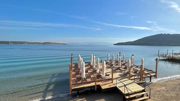 Private beach, sun loungers, beach umbrellas