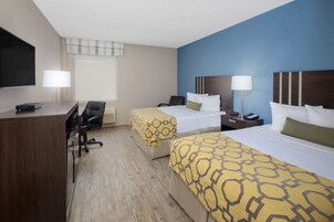 Desk, laptop workspace, blackout drapes, iron/ironing board