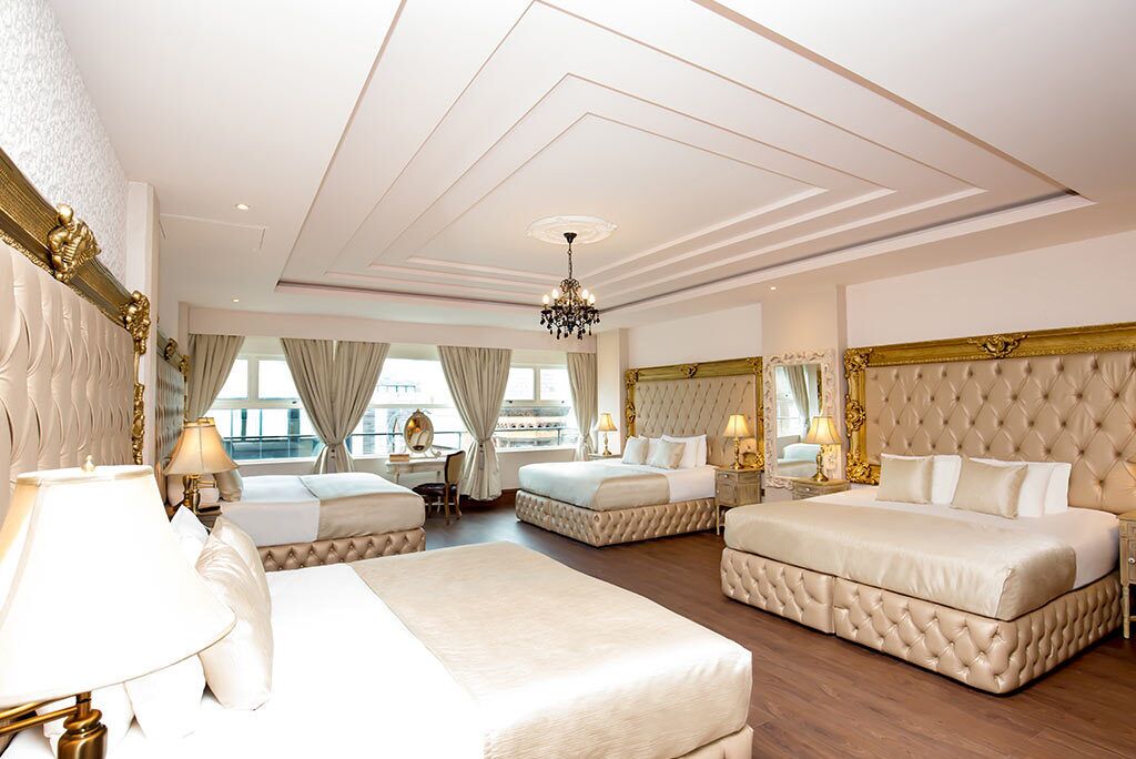 deluxe room | 1 bedroom, premium bedding, in-room safe, desk