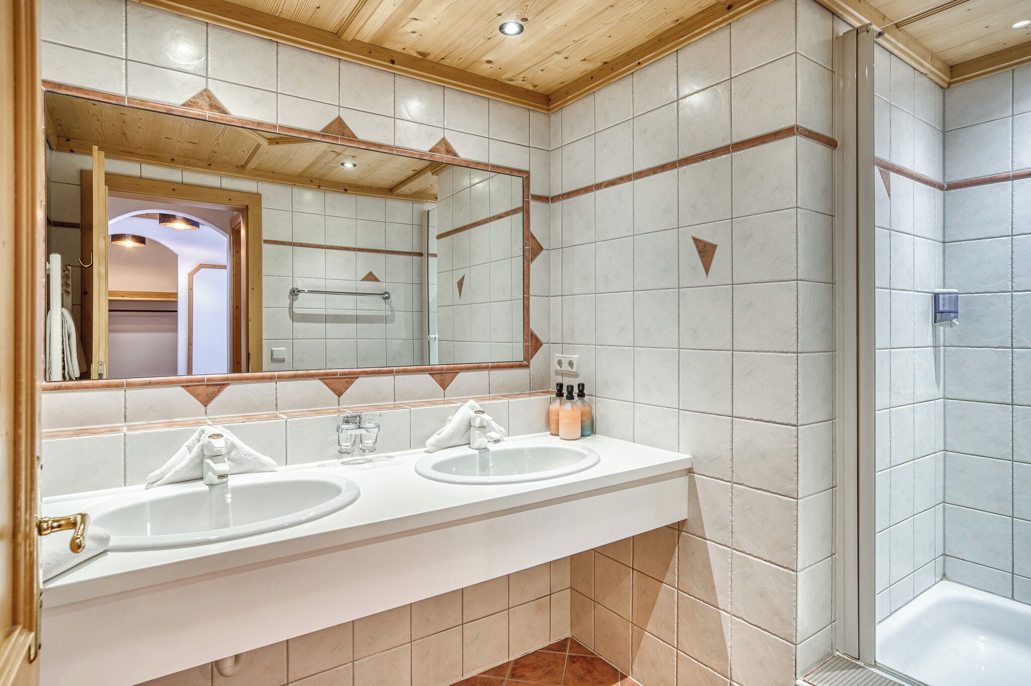 shower, hair dryer, bathrobes, towels