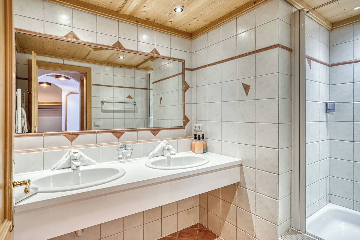 shower, hair dryer, bathrobes, towels