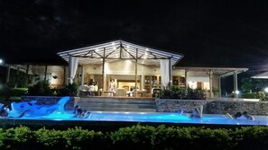 Outdoor pool, pool umbrellas, sun loungers