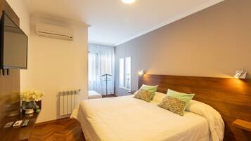 Standard Apartment | Premium bedding, in-room safe, laptop workspace, iron/ironing board
