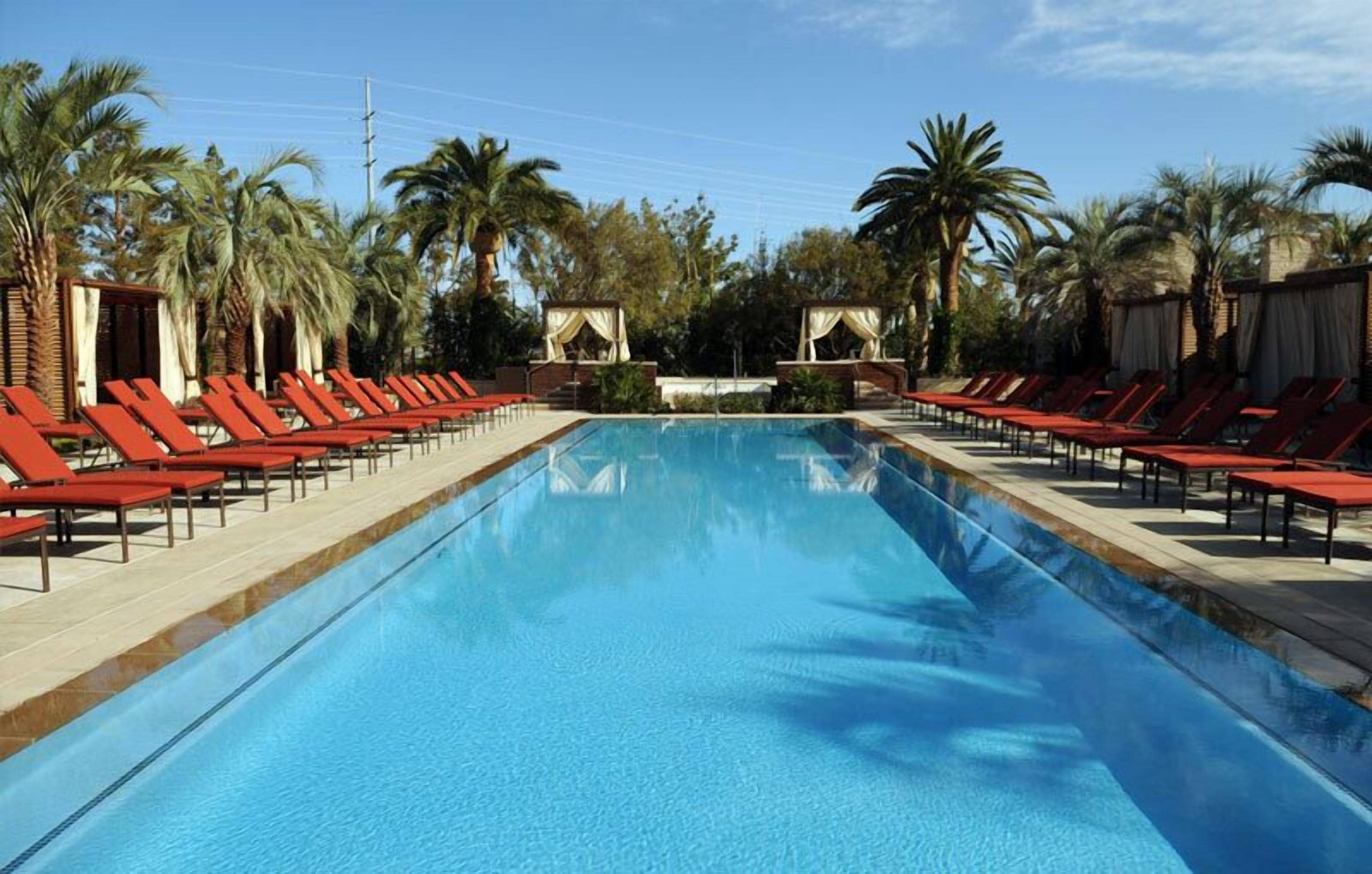 Seasonal outdoor pool, open 10:30 AM to 5:30 PM, sun loungers