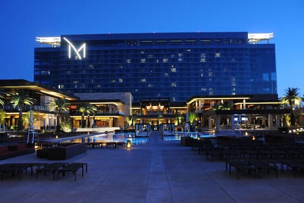 Seasonal outdoor pool, open 10:30 AM to 5:30 PM, pool loungers