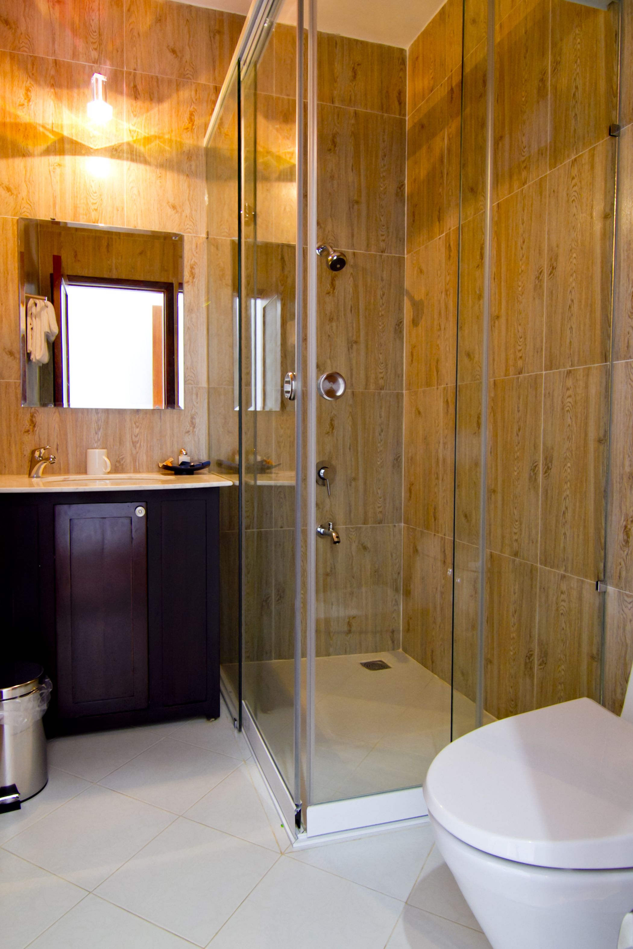 deluxe triple room | bathroom | shower, free toiletries, hair dryer, slippers