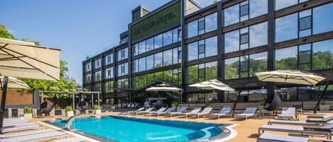 Outdoor pool, pool umbrellas, pool loungers