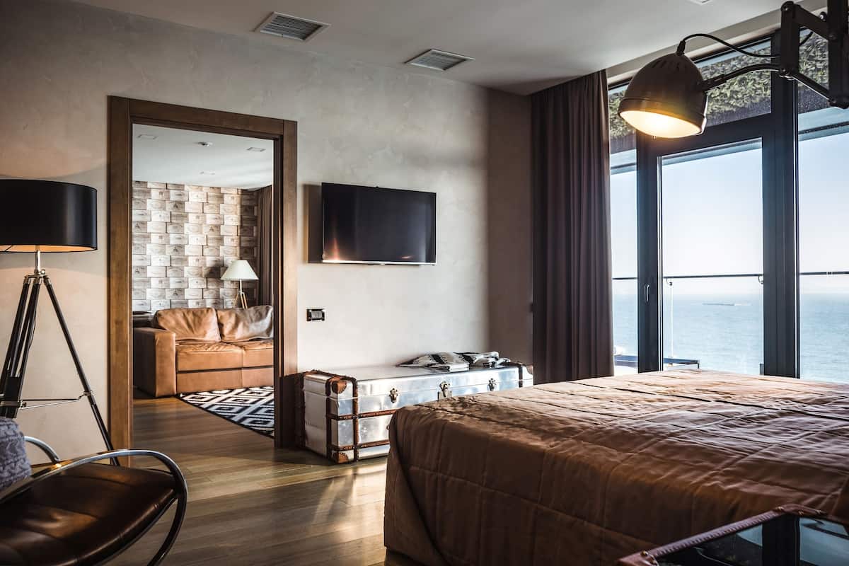 Suite Executive, terrazzo, vista mare | Biancheria da letto di alta qualità, minibar, una cassaforte in camera