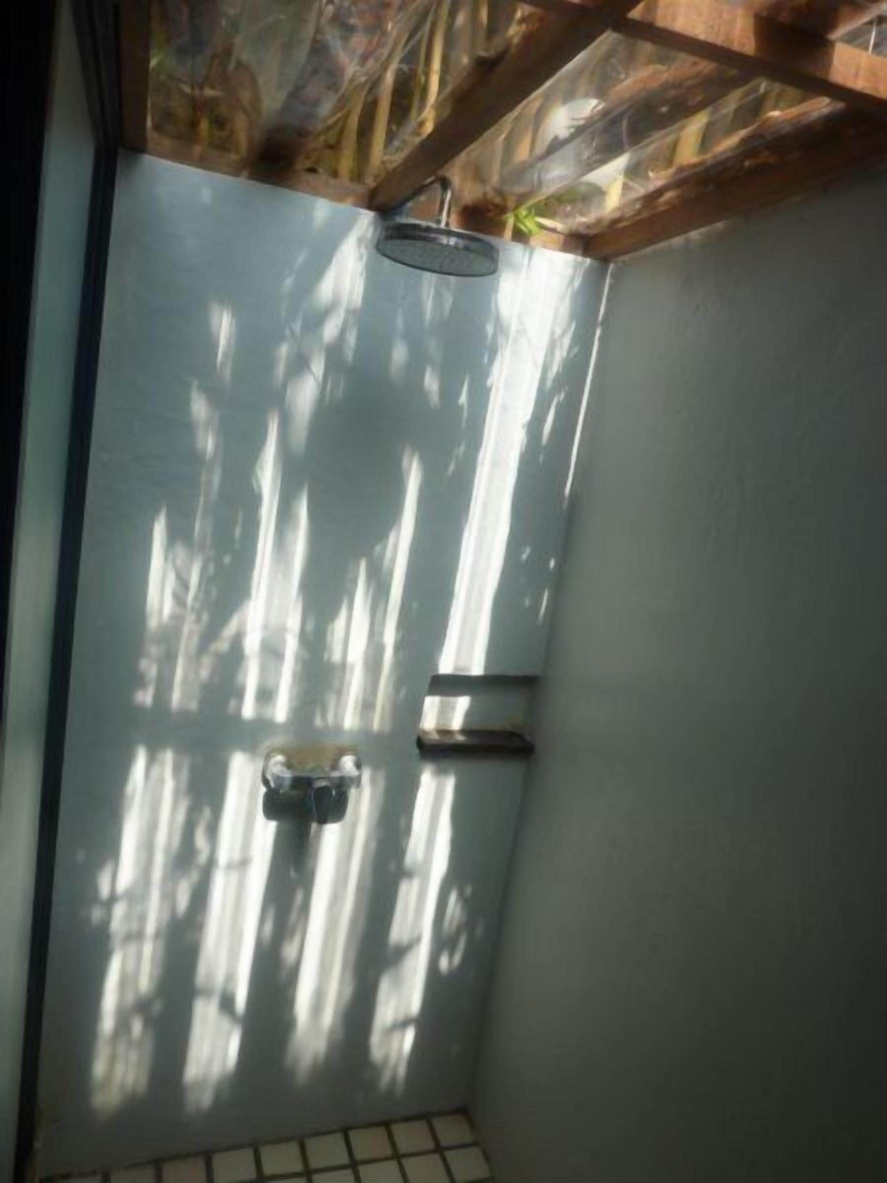 garden view fan bungalow | bathroom shower