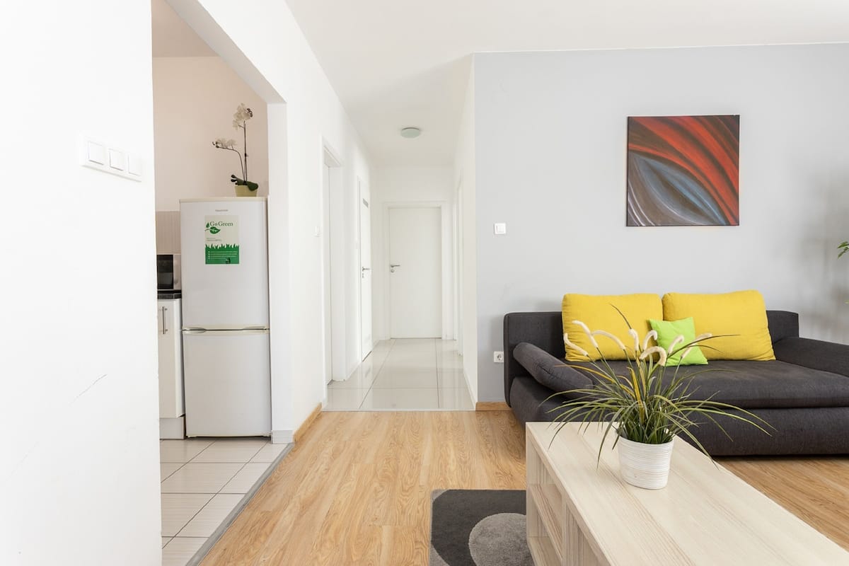 Deluxe 3 bedroom Apartment | Living area | 80-cm flat-screen TV with digital channels, LED TV