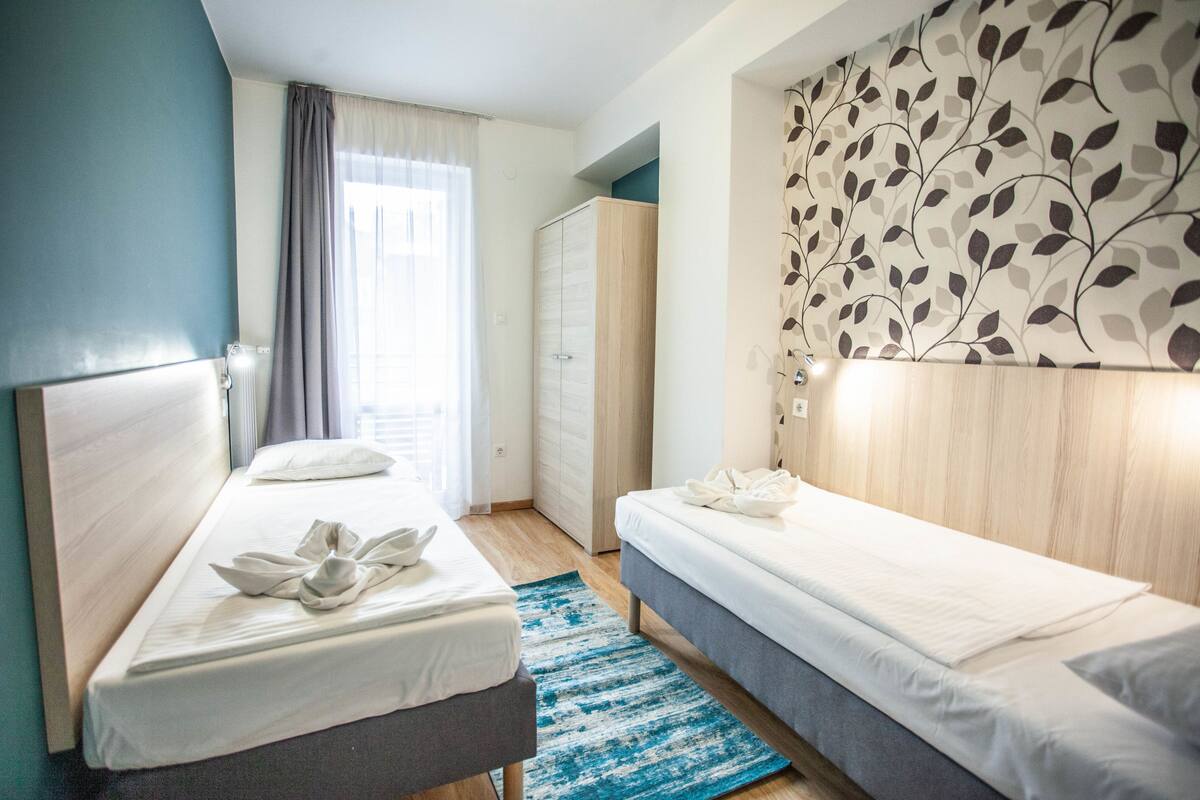 Deluxe Apartment, 2 Bedrooms | 1 bedroom, blackout drapes, iron/ironing board, free WiFi