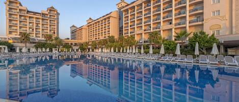 Indoor pool, 2 outdoor pools, pool umbrellas, sun loungers