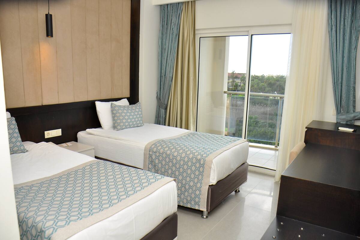 Economy Room, Multiple Beds | Premium bedding, minibar (free items), in-room safe, desk