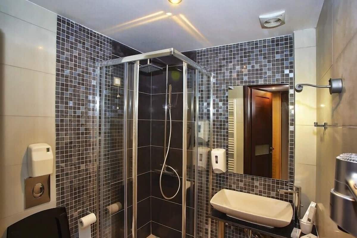 junior suite, 1 bedroom, mountain view | bathroom | free toiletries, hair dryer, bathrobes, slippers