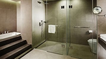 Suite, 1 King Bed | Bathroom | Shower, hair dryer, bathrobes, slippers