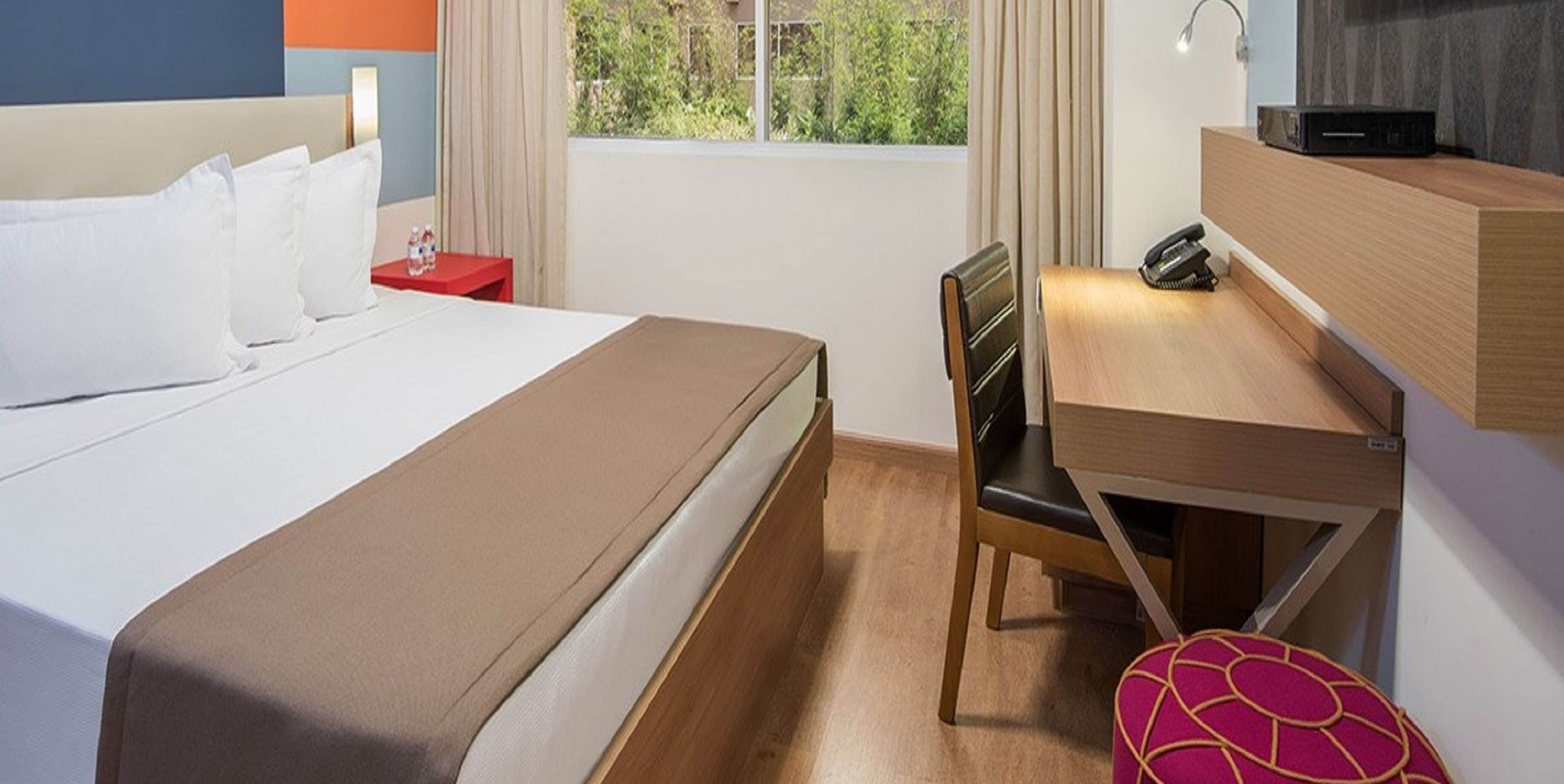 Desk, blackout drapes, soundproofing, free WiFi